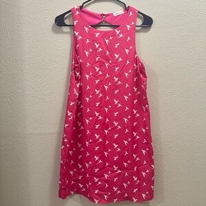 Everly pink mini dress with bird pattern in white, size small.
